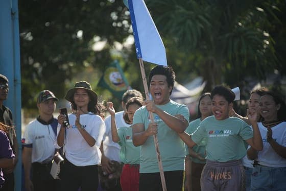 Team Cheering With Flags