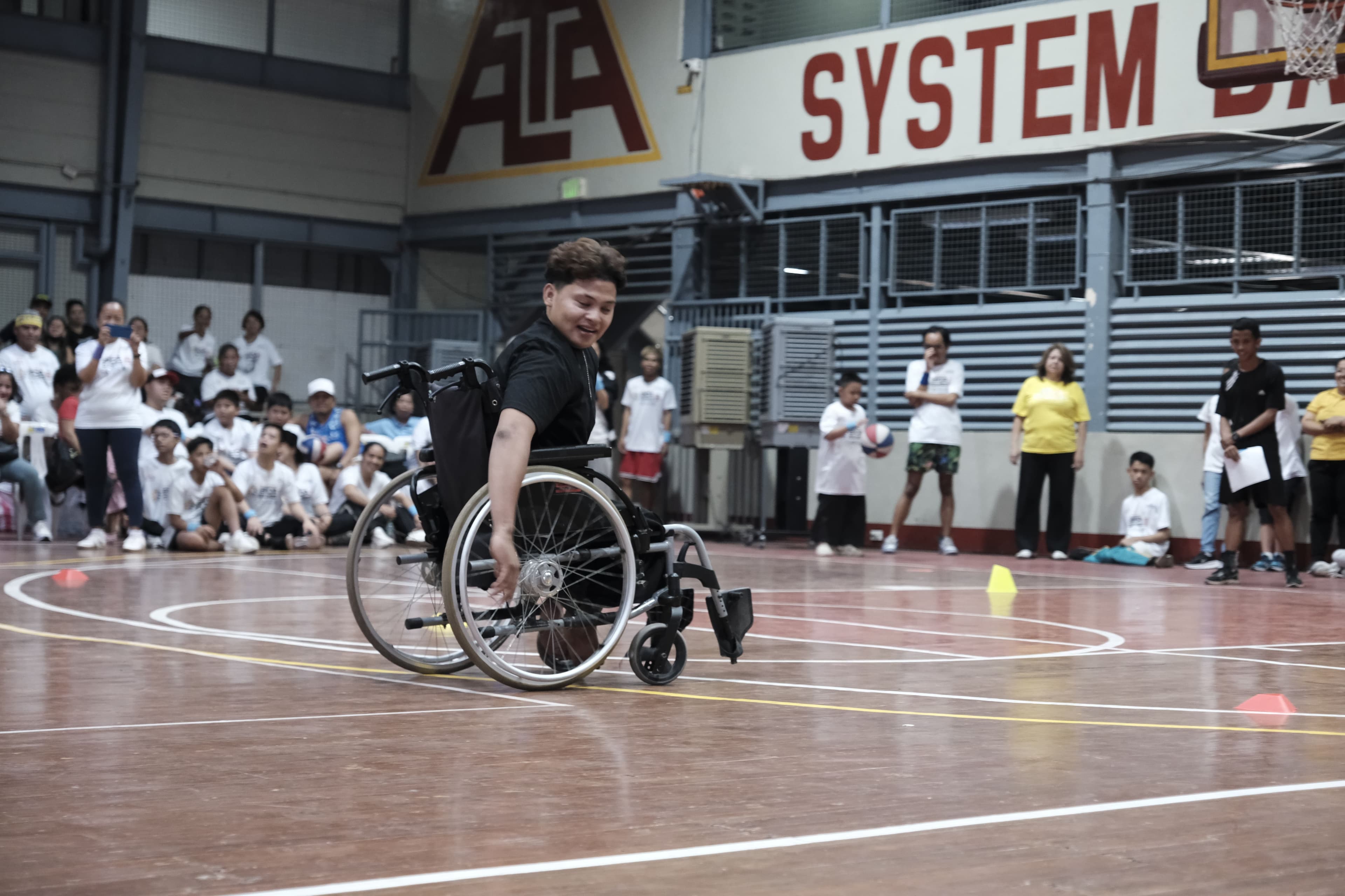 Wheelchair Race, Cheered On by Volunteers