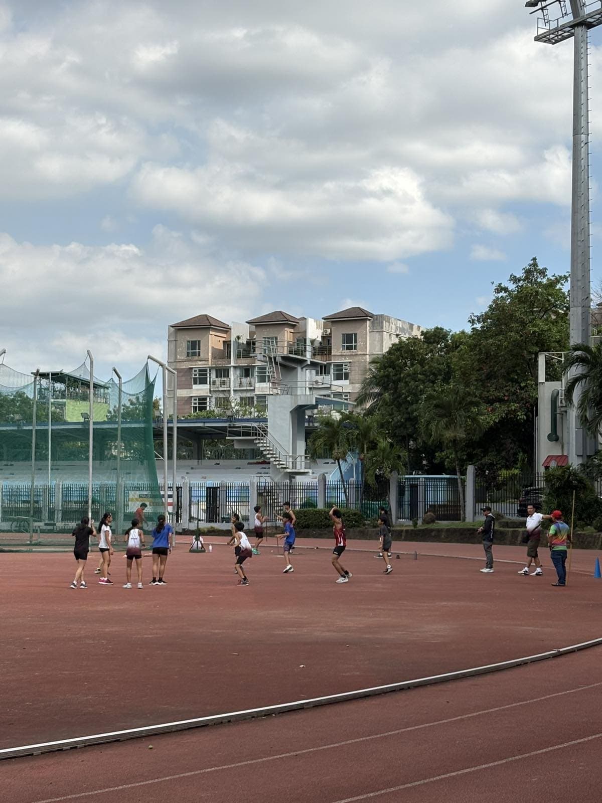 Athletes Warming Up on the Track