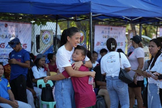 A Parent and Child at the Registration Area