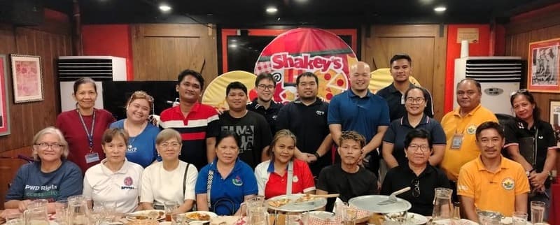 JCI Manila's committee meets with focal persons from Muntinlupa's eight barangays over dinner.